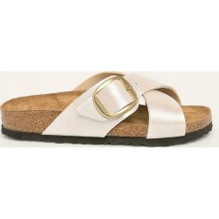 Birkenstock - Klapki Siena Big Buckle. Żółte klapki damskie Birkenstock, bez wzorów, z gumy, bez obcasa, na obcasie. W wyprzedaży za 299,90 zł.