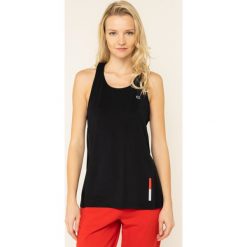 Top Calvin Klein Performance 00GWH9K171. Czarne bluzki damskie Calvin Klein Performance, m, bez wzorów, z elastanu, polo, bez rękawów. W wyprzedaży za 189,00 zł.