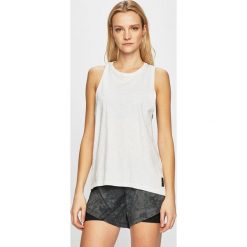 Reebok - Top. Białe topy damskie Reebok, s, bez wzorów, z bawełny, z okrągłym kołnierzem. W wyprzedaży za 99,90 zł.