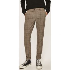 Jack & Jones - Spodnie. Brązowe spodnie męskie Jack & Jones, na co dzień, bez wzorów, z elastanu, casualowe. Za 259,90 zł.