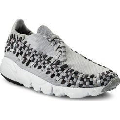 Buty NIKE - Air Footscape Woven Nm 875797 004 Wolf Grey/Black/Dark Grey. Szare półbuty męskie Nike, na co dzień, bez wzorów, z tworzywa sztucznego, bez zapięcia. W wyprzedaży za 409,00 zł.