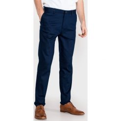 Scotch & Soda Mott Spodnie Niebieski. Niebieskie spodnie męskie Scotch & Soda, bez wzorów, z elastanu. Za 536,95 zł.