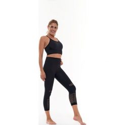 Legginsy sportowe w kolorze czarnym. Czarne legginsy sportowe damskie Liposlim, m, z tkaniny. W wyprzedaży za 107,95 zł.