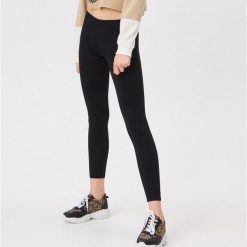 Bawełniane legginsy - Czarny. Czarne legginsy damskie Sinsay, s, bez wzorów, z bawełny. Za 14,99 zł.