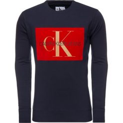 Bluza Calvin Klein Jeans J30J313567. Niebieskie bluzy męskie Calvin Klein Jeans, m, bez wzorów, z jeansu, bez kołnierzyka, bez rękawów, bez kaptura. W wyprzedaży za 229,00 zł.