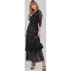 Czarna Sukienka Queta. Czarne sukienki damskie Renee, s, z aplikacjami, eleganckie, z falbankami, bez rękawów, maxi, kopertowe. Za 179,99 zł.