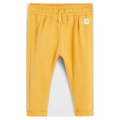 Mango Kids - Spodnie dziecięce Mireiap5 80-104 cm. Czerwone spodnie dziewczęce Mango Kids, bez wzorów, z bawełny, casualowe. Za 35,90 zł.