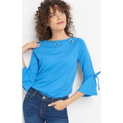 Koszulka z aplikacją 3D. Niebieskie t-shirty damskie Orsay, xs, z aplikacjami, z dzianiny. W wyprzedaży za 55,00 zł.