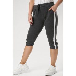 Ciemnoszare Spodnie Aterodia. Szare spodnie damskie Born2be, xl, z dresówki. W wyprzedaży za 29,99 zł.