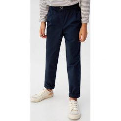 Mango Kids - Spodnie dziecięce Chin 110-164 cm. Różowe spodnie dziewczęce Mango Kids, bez wzorów, z bawełny, casualowe. Za 69,90 zł.