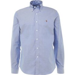 Polo Ralph Lauren Golf Koszula blue. Niebieskie koszule męskie marki Polo Ralph Lauren Golf, xxl, bez wzorów, z bawełny, sportowe, z golfem, bez rękawów. Za 419,00 zł.