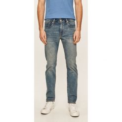 Levi's - Jeansy 502 Taper. Czerwone jeansy męskie Levi's®, s, z aplikacjami. Za 469,90 zł.