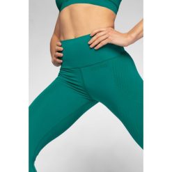 Legginsy treningowe z wysokim stanem 4FPro SPDF411 - zielony. Zielone legginsy damskie 4f, bez wzorów, z dzianiny. Za 179,99 zł.