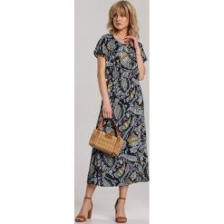 Granatowa Sukienka Guinerin. Niebieskie sukienki damskie Renee, xl, bez wzorów, bez kołnierzyka, bez rękawów, maxi. W wyprzedaży za 74,99 zł.