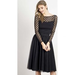 Czarna Elegancka Bluzka z Tiulem w Grochy. Czarne bluzki damskie Molly.pl, s, w grochy, z dzianiny, eleganckie, bez kołnierzyka, z długim rękawem. Za 99,90 zł.