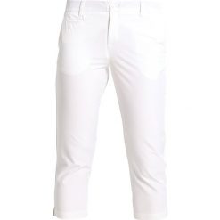 Spodnie dresowe damskie: Under Armour LINKS CAPRI Rybaczki sportowe white