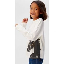 Mango Kids - Longsleeve dziecięcy Caballo 110-164 cm. Białe bluzki dziewczęce z nadrukiem, z bawełny, z okrągłym kołnierzem, długie. Za 59,90 zł.