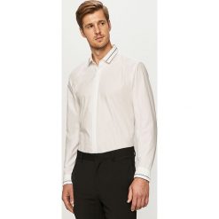 Hugo - Koszula. Białe koszule męskie HUGO, bez wzorów, z bawełny, eleganckie, z klasycznym kołnierzykiem, z długim rękawem. Za 399,90 zł.