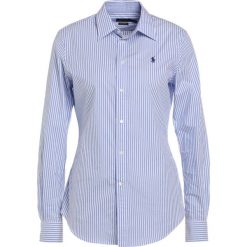 Polo Ralph Lauren STRETCH SLIM FIT Koszula spring blue. Niebieskie koszulki damskie polo Polo Ralph Lauren, bez wzorów, z elastanu, polo, bez rękawów. Za 459,00 zł.