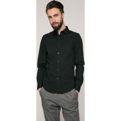G-Star Raw - Koszula. Czarne koszule męskie G-Star RAW, m, bez wzorów, z elastanu, klasyczne, z klasycznym kołnierzykiem, z długim rękawem. W wyprzedaży za 179,90 zł.