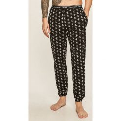 Calvin Klein Underwear - Spodnie piżamowe CK One. Czarne piżamy męskie Calvin Klein Underwear, na co dzień, xl, bez wzorów, z elastanu. Za 199,90 zł.