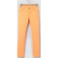 Spodnie slim, 10-16 lat. Żółte rurki dziewczęce marki La Redoute Collections, z bawełny. Za 57,75 zł.