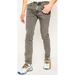Jeansy Slim Fit Calvin Klein Jeans J30J307724911. Szare jeansy męskie Calvin Klein Jeans, m, bez wzorów, z elastanu. W wyprzedaży za 399,00 zł.