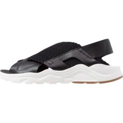 Nike Sportswear AIR HUARACHE RUN Sandały black/sail/med brown. Czarne rzymianki damskie Nike Sportswear, z materiału. Za 419,00 zł.