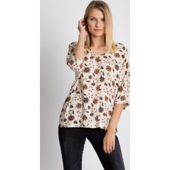 Wzorzysta bluzka typu kimono RABARBAR. Bluzki damskie RABARBAR, z nadrukiem, z jeansu, eleganckie, bez kołnierzyka, bez rękawów. W wyprzedaży za 102,00 zł.