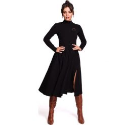 Spódnica midi rozkloszowana - czarna. Czarne spódniczki damskie BE, s, z elastanu, sportowe, midi, rozkloszowane. Za 169,00 zł.