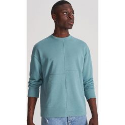 Bluza z asymtrycznymi przeszyciami - Niebieski. Niebieskie bluzy męskie Reserved, s, bez wzorów, bez kołnierzyka, bez rękawów, bez kaptura. Za 119,99 zł.
