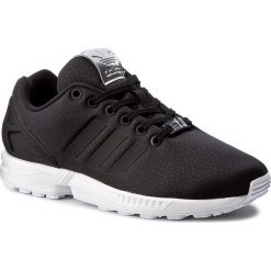 Buty adidas - Zx Flux W BY9215 Cblack/Cblack/Silvmt. Czarne buty sportowe damskie Adidas, bez wzorów, z tworzywa sztucznego, bez obcasa, na płaskiej podeszwie, bez zapięcia. W wyprzedaży za 269,00 zł.
