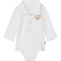 Body w kolorze białym. Białe body niemowlęce Steiff, z aplikacjami. W wyprzedaży za 59,95 zł.