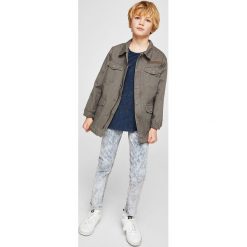 Mango Kids - Jeansy dziecięce United 110-164 cm. Niebieskie jeansy męskie marki Mango Kids, z elastanu. W wyprzedaży za 49,90 zł.