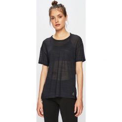 Reebok - Top. Czarne topy damskie Reebok, s, bez wzorów, z poliesteru, z okrągłym kołnierzem. W wyprzedaży za 79,90 zł.