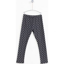 Lemon Explore - Legginsy dziecięce 128-164 cm. Czarne spodnie dziewczęce marki LEMON explore, bez wzorów, z elastanu. W wyprzedaży za 39,90 zł.