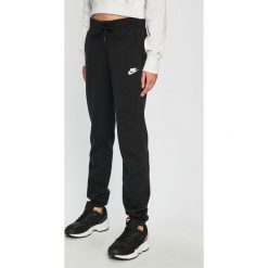 Nike Sportswear - Spodnie. Czarne spodnie damskie marki Nike Sportswear, s, z bawełny. Za 159,90 zł.