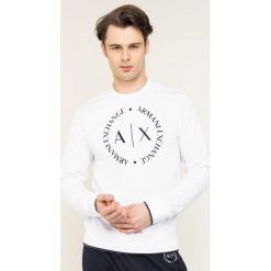 Bluza Armani Exchange 8NZM87 Z9N1Z 1100. Białe bluzy męskie Armani Exchange, m, bez wzorów, z elastanu, bez kołnierzyka, bez rękawów, bez kaptura. W wyprzedaży za 339,00 zł.