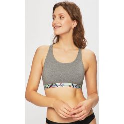 Reebok - Biustonosz. Szare biustonosze sportowe damskie Reebok, s, bez wzorów, z elastanu. Za 79,90 zł.