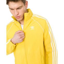 Adidas Originals SST Kurtka Żółty. Żółte płaszcze męskie adidas Originals, s, bez wzorów, z materiału, bez kaptura. Za 369,95 zł.