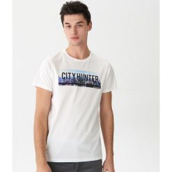 T-shirt z nadrukiem - Kremowy. Białe t-shirty damskie House, s, z nadrukiem, bez kołnierzyka. Za 39,99 zł.