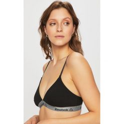 Reebok - Biustonosz sportowy. Czarne biustonosze sportowe damskie Reebok, s, bez wzorów, z elastanu. Za 79,90 zł.