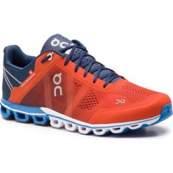Buty ON - Cloudflow 00015 Rust/Pacific. Pomarańczowe buty sportowe męskie On, z tworzywa sztucznego, bez zapięcia, do biegania. W wyprzedaży za 459,00 zł.