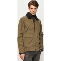 Quiksilver - Kurtka. Żółte płaszcze męskie Quiksilver, s, bez wzorów, z bawełny, krótkie, bez kaptura. Za 499,90 zł.