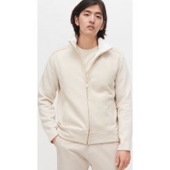 Rozpinana bluza z imitacji zamszu - Kremowy. Białe bluzy męskie Reserved, s, bez wzorów, bez kołnierzyka, bez rękawów, bez kaptura. Za 159,99 zł.
