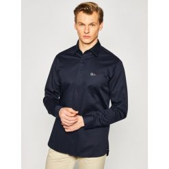 Koszula TOMMY HILFIGER MERCEDES-BENZ Clean Tech TT0TT07171. Niebieskie koszule męskie TOMMY HILFIGER, xxl, bez wzorów, z elastanu, biznesowe, bez kołnierzyka, bez rękawów. W wyprzedaży za 469,00 zł.
