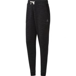 EL MARBLE PANT BLACK. Czarne spodnie damskie Reebok, na wiosnę, bez wzorów, z bawełny, na fitness i siłownię. Za 149,99 zł.