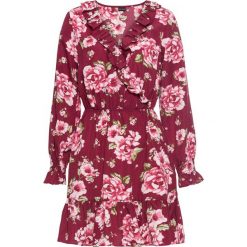 Sukienka w kwiatki bonprix czerwony rododendron w kwiaty. Fioletowe sukienki damskie bonprix, z nadrukiem, bez kołnierzyka, bez rękawów, kopertowe. Za 129,99 zł.