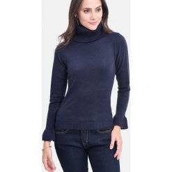 Sweter w kolorze granatowym. Niebieskie swetry damskie William de Faye, bez wzorów, z kaszmiru, bez rękawów, bez kaptura. W wyprzedaży za 129,95 zł.