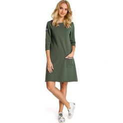 DAMIEN Sukienka trapezowa z kieszenią - militarno zielona. Żółte sukienki damskie dzianinowe marki Moe, na co dzień, eleganckie, trapezowe. Za 149,00 zł.